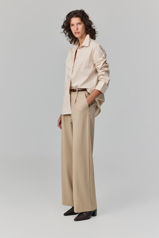 מכופתרת על אמת