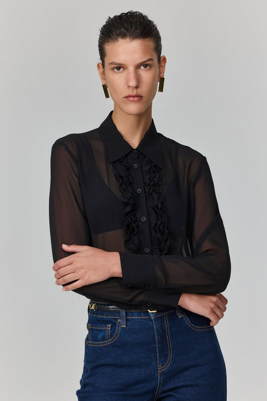 המכופתרת שקורצת