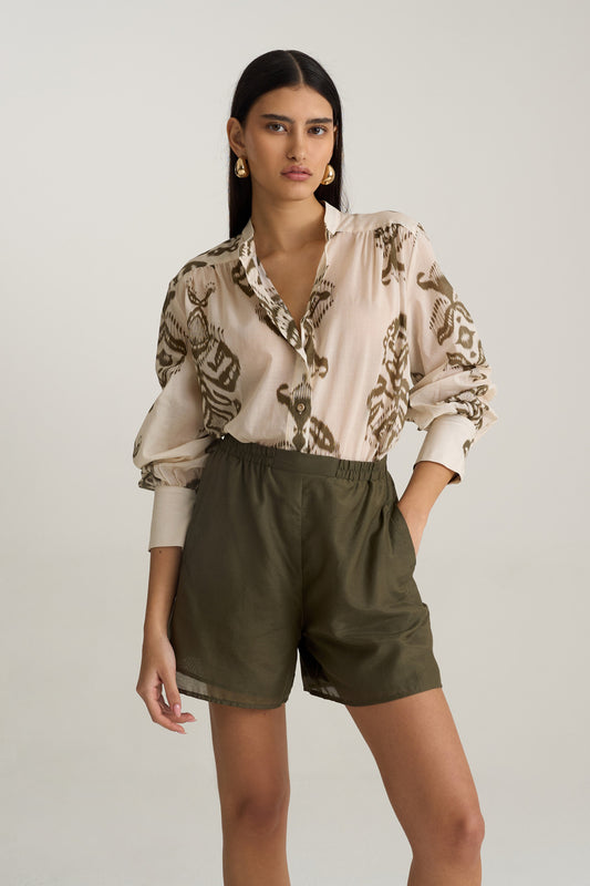 מכנסיים עם ירוק בעיניים